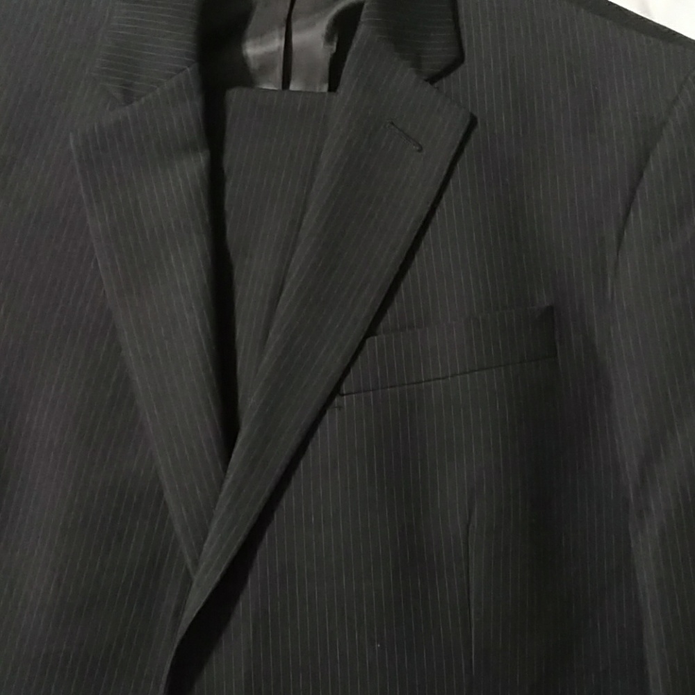 Kenneth Cole suit.